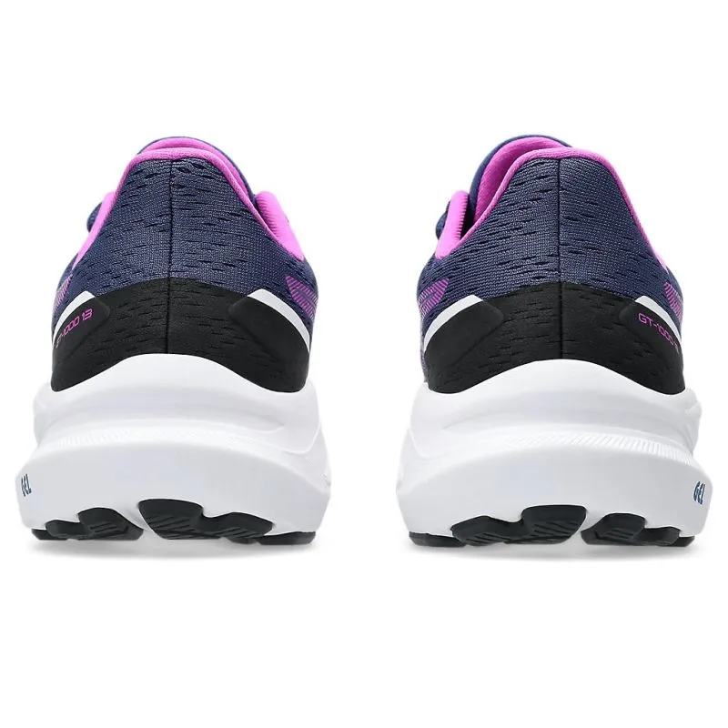 ASICS GT-1000 13 GS Kids Running Shoes running in a baseball field area shoes Comfort Padding Around Ankle