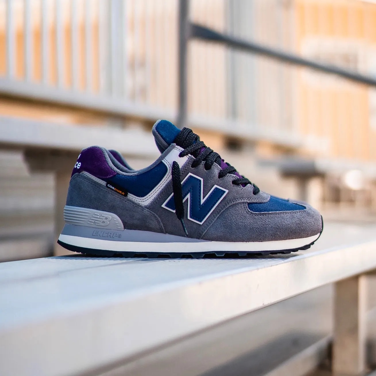 absorbing bright - colors Mens New Balance 574 (Grey/Blue) - U574KGN