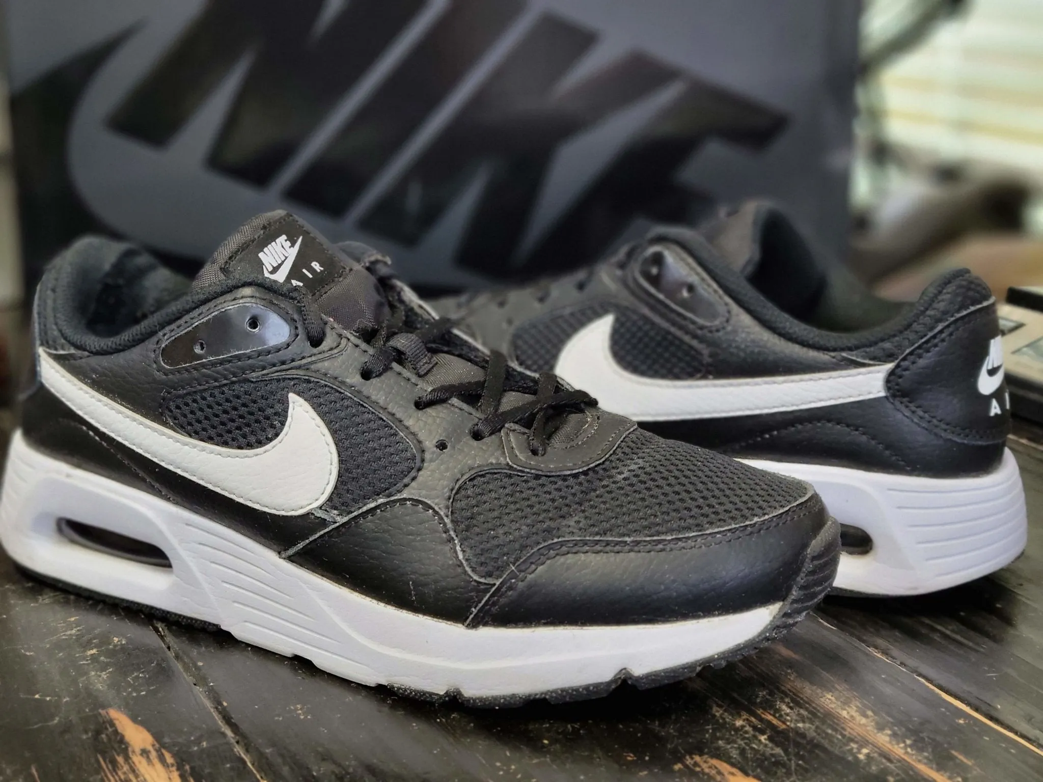 2021 Nike Air Max SC Black/White Running Shoes  CW4554-001 Women 8 running in a sidewalk area shoes