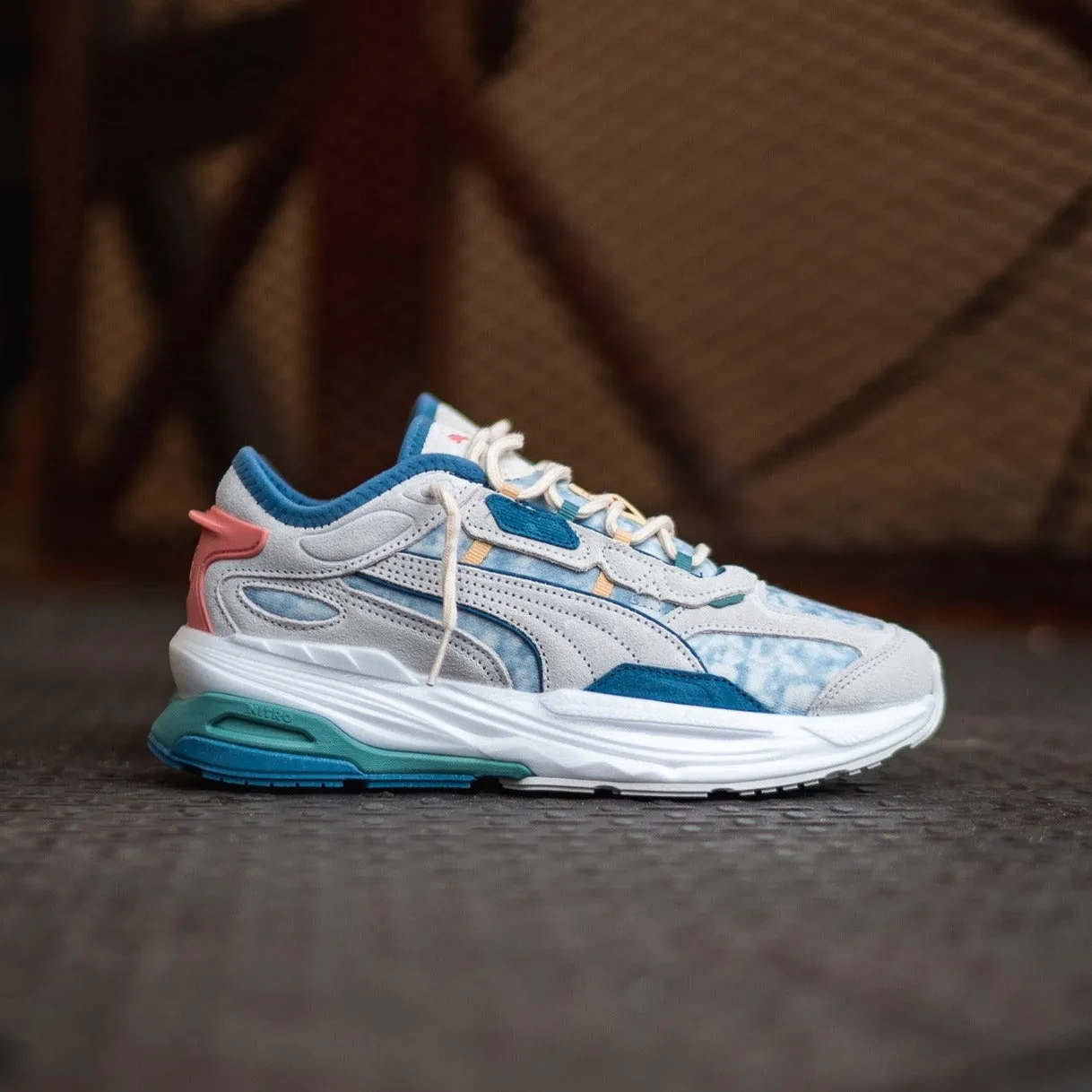 commuters engaging Men's Puma Extent Nitro RE:ESCAPE (Vapor Gray/Deep Dive)