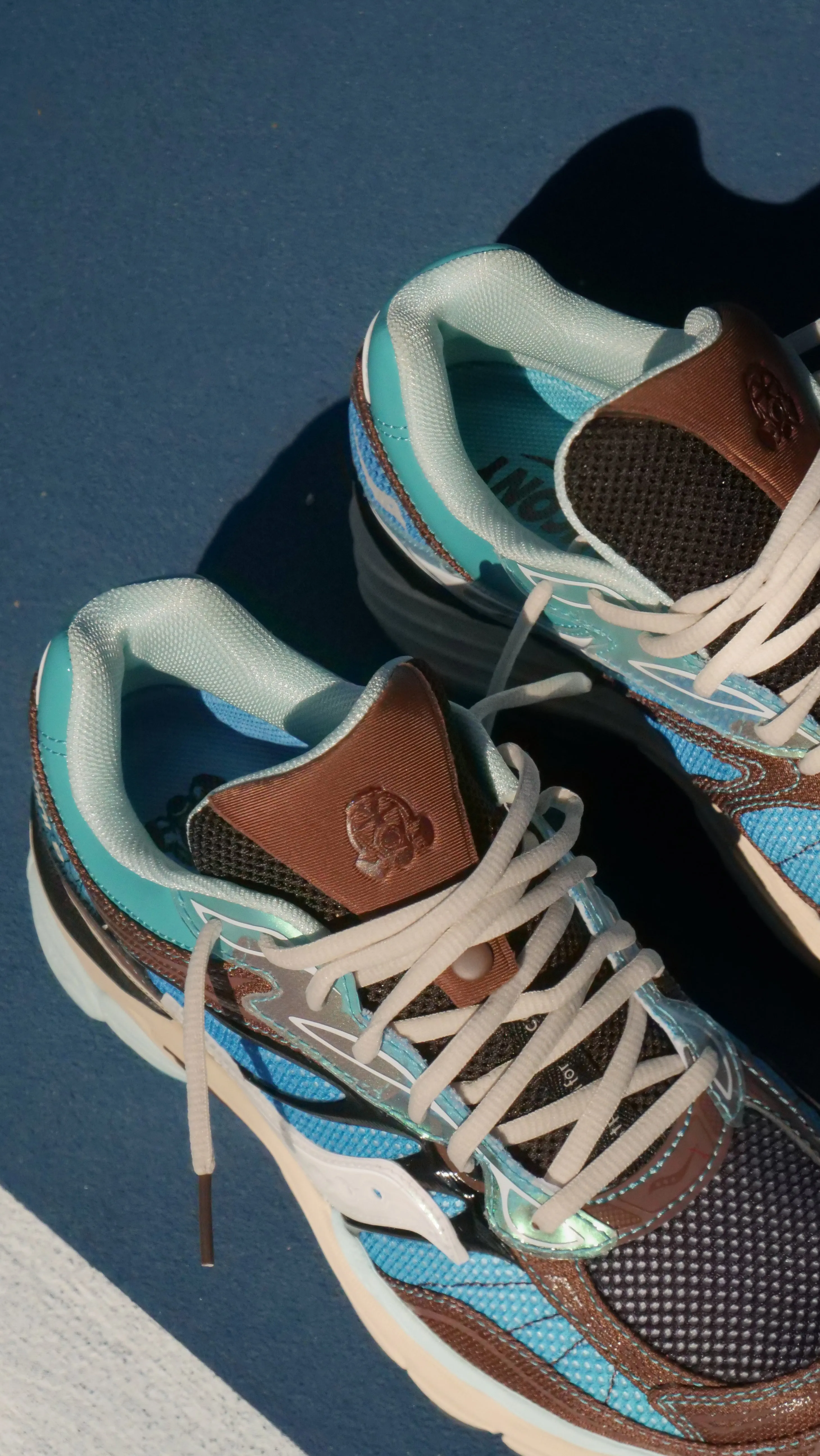 Mens Saucony x FootPatrol ProGrid Omni 9 (Blue/Brown) lake professionals - specific functions