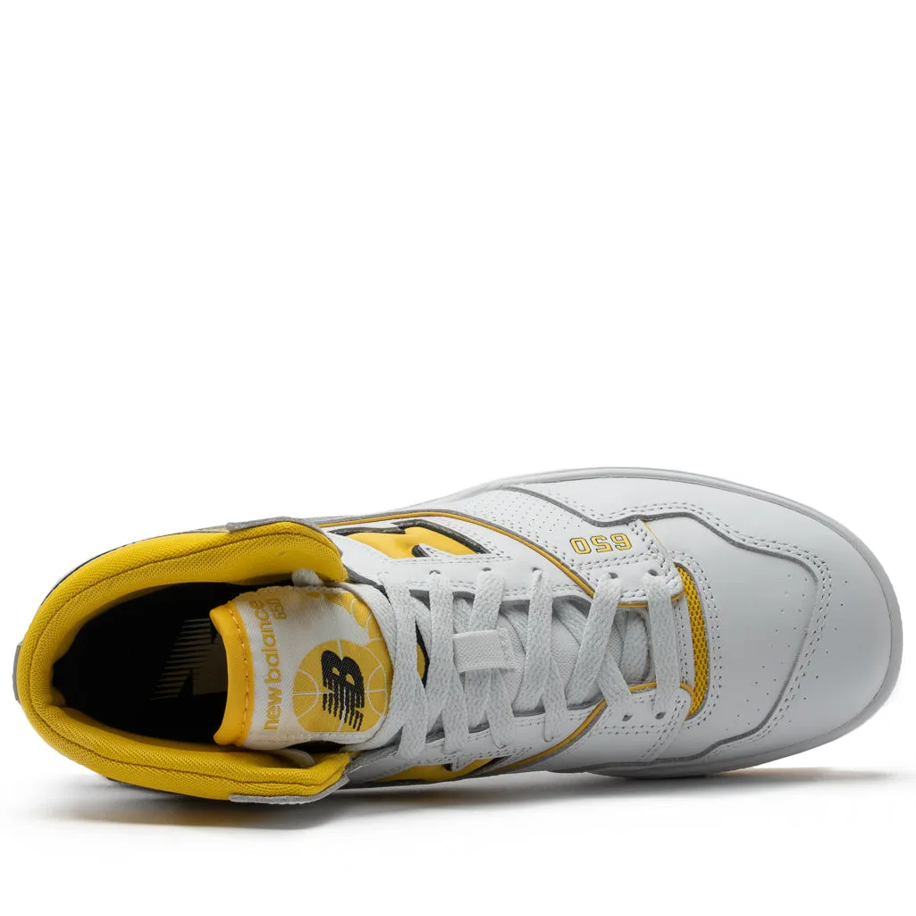 New Balance 650R - White/Yellow logo - buckled shoes