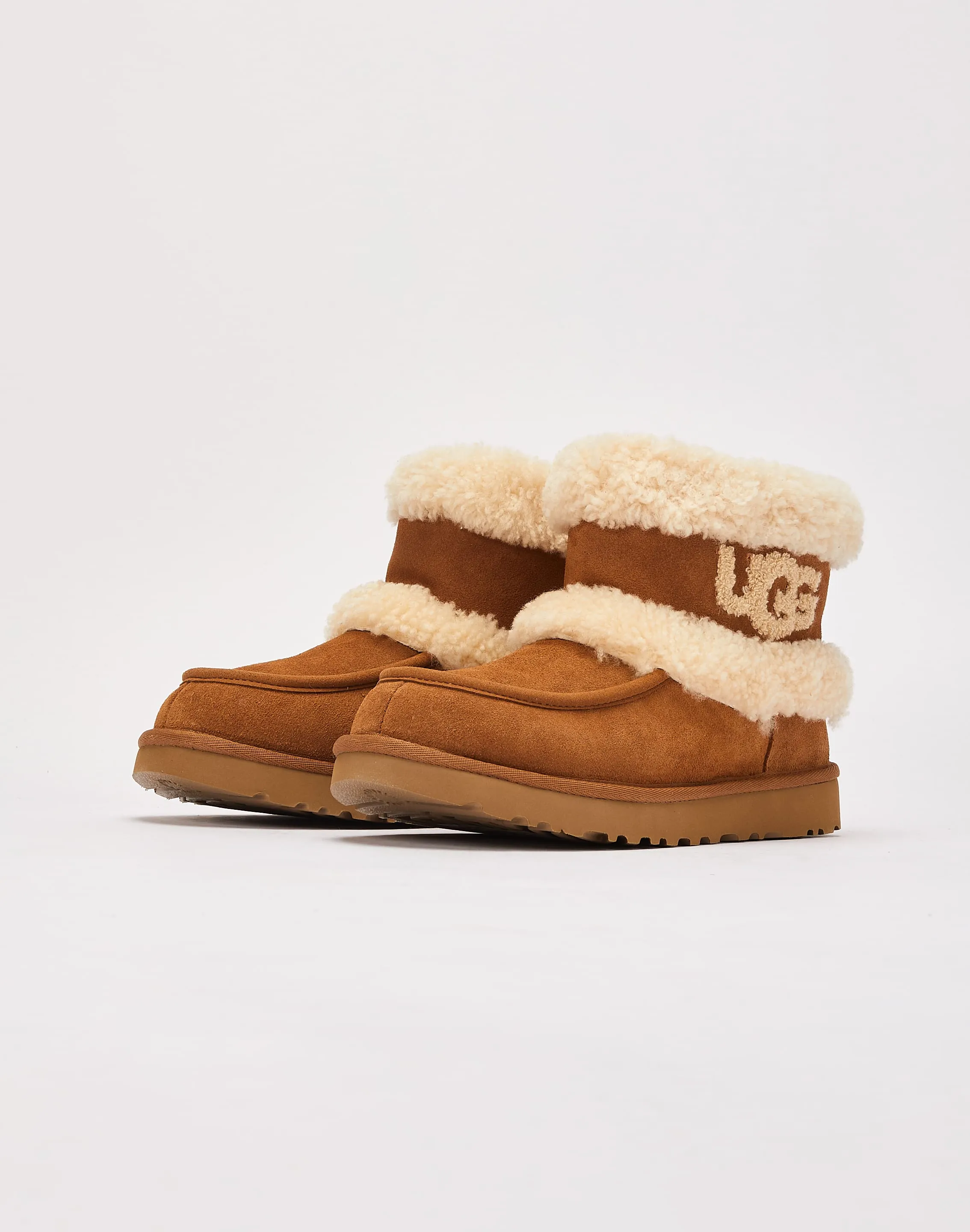 UGG Ultra Mini Fluff Boots Fast Motion Neutral Stride Design