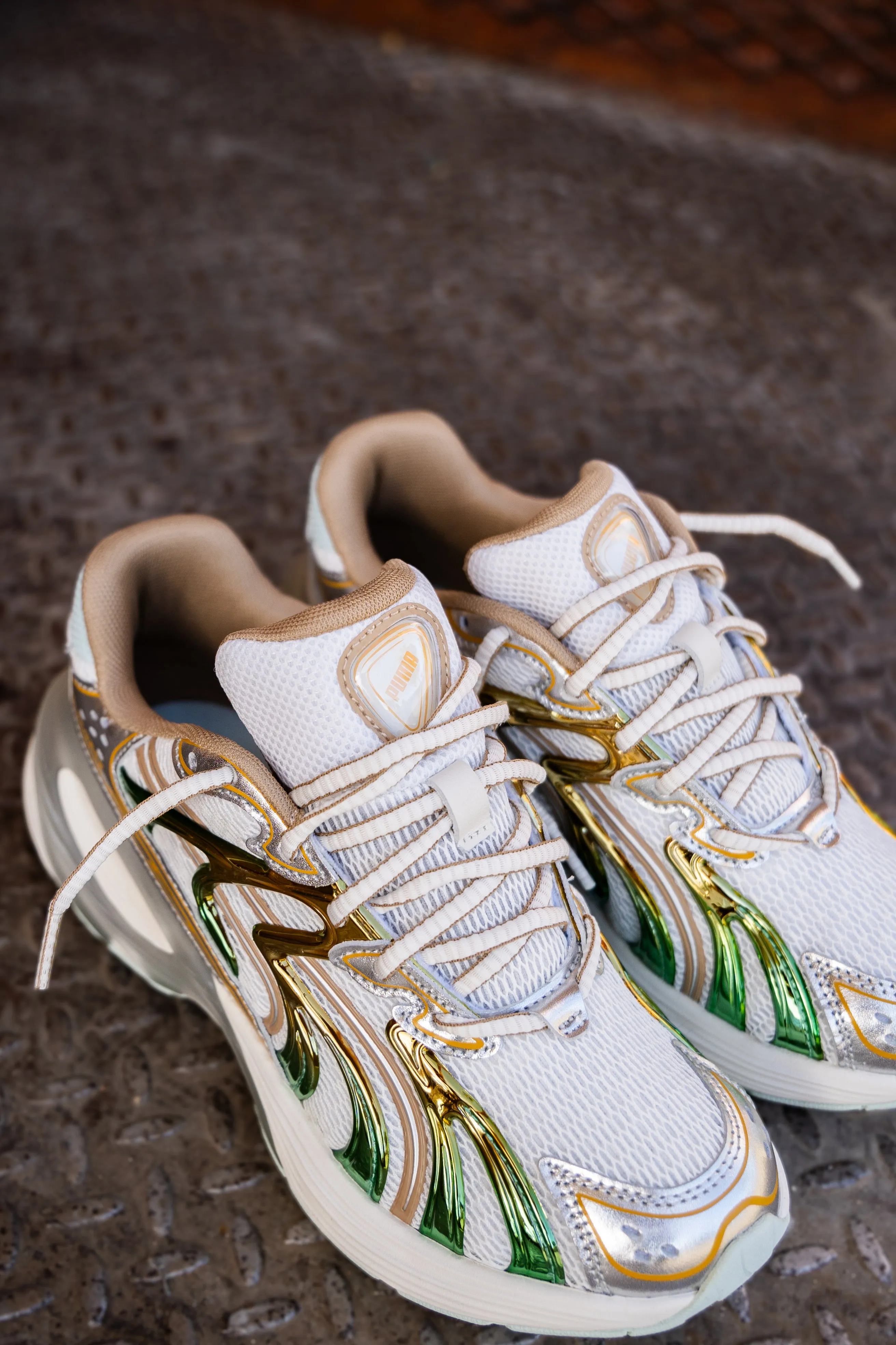 Womens Puma Inverse Shimmer (Warm White/Archive Gold) Wind Block Moon Walk